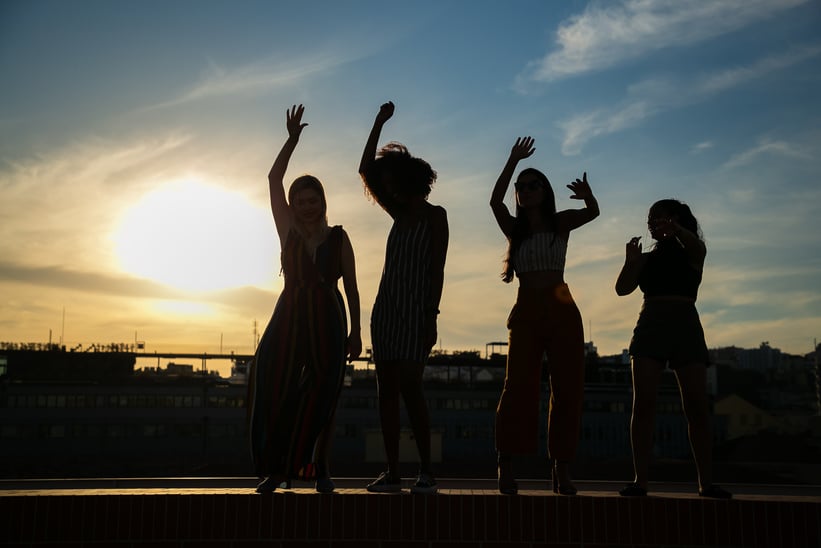 Women Dancing on Rooftop